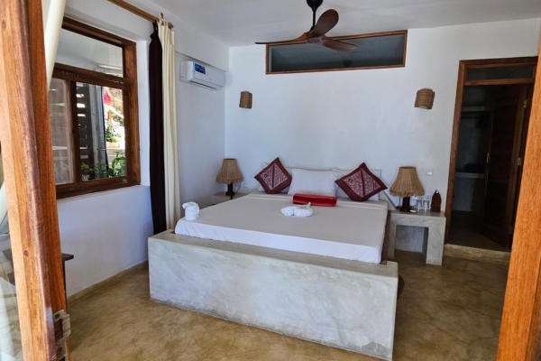 Palafitta zanzibar villa room 1